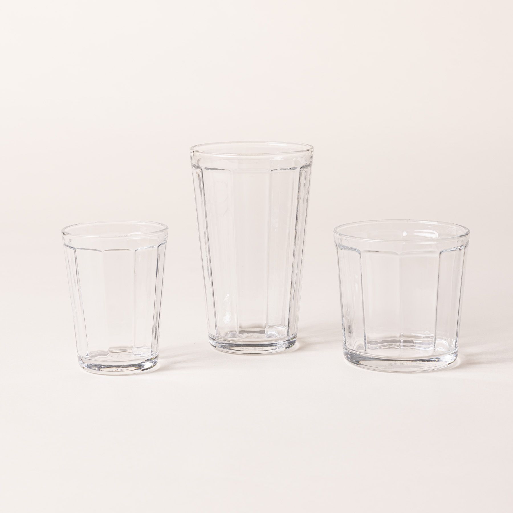 3 diner-style glass that tapers to be wider at the top in a short wide, a medium, and tall sizes