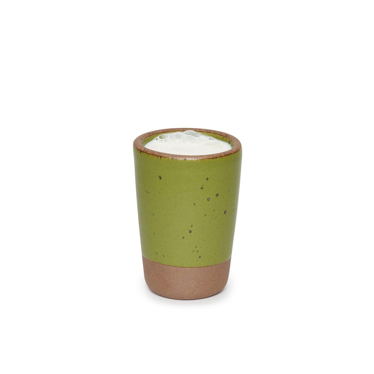 Juice Cup in Fiddlehead, a mossy, olive green. Pictured filled with milk.