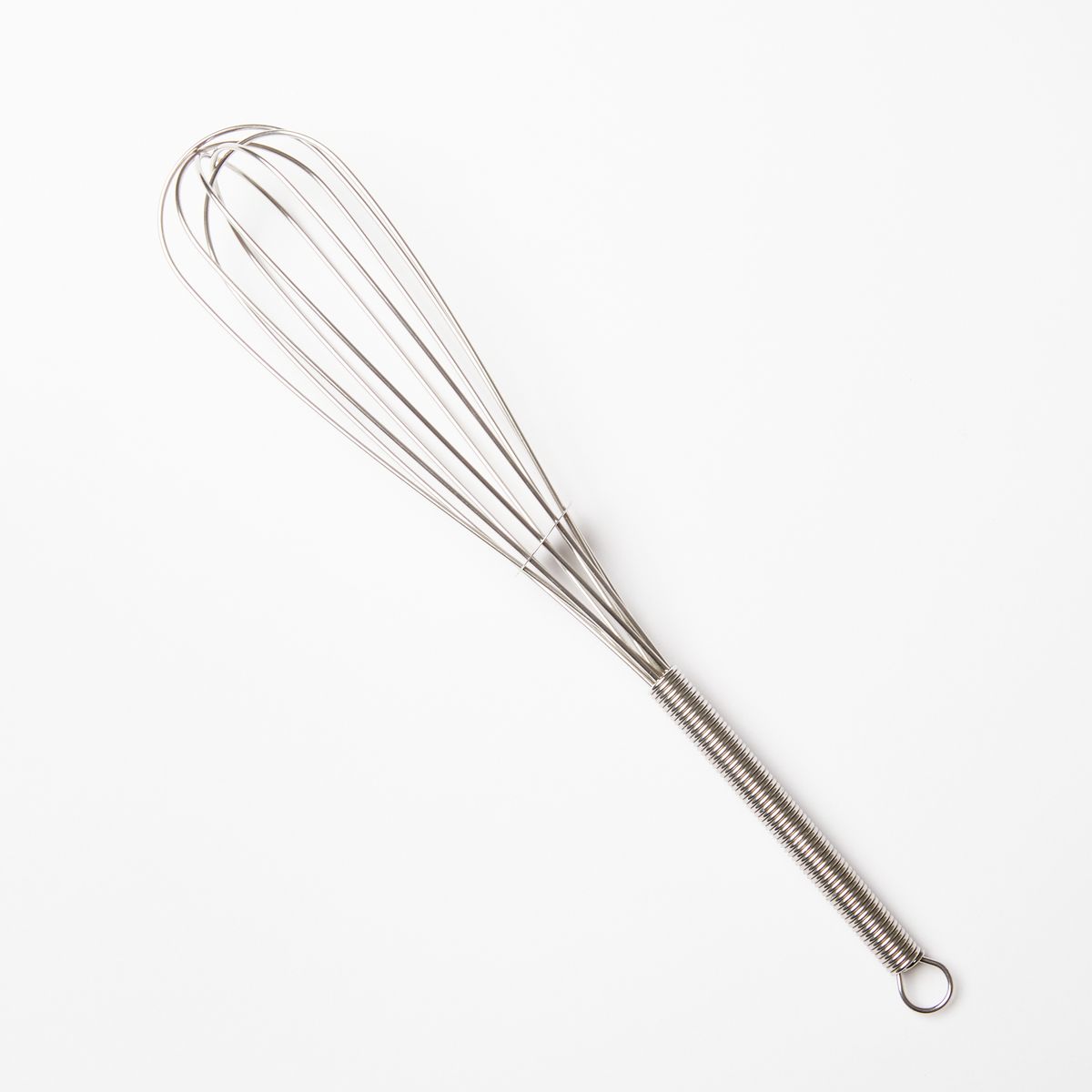 Tiny slim stainless steel whisk with a little circle hook on the end of the handle