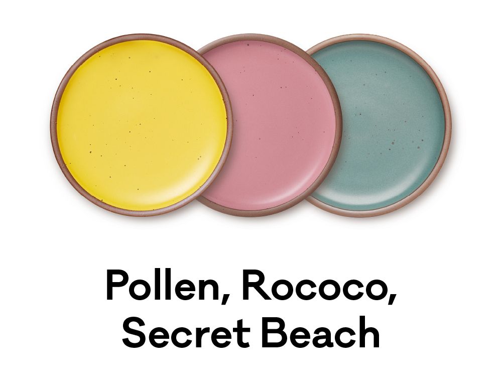 Three plates in a bright yellow, hot pink, and seafoam blue are positioned next to each other. Underneath, text reads: "Pollen, Rococo, Secret Beach"