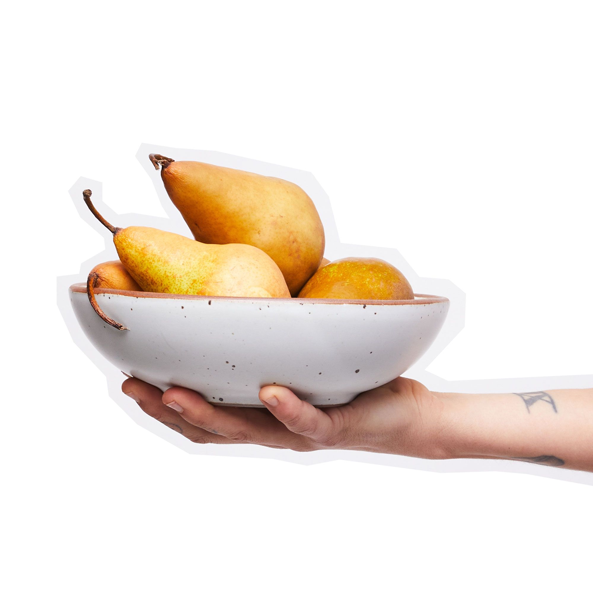 A cutout graphic of a hand holding a ceramic white bowl with whole pears inside