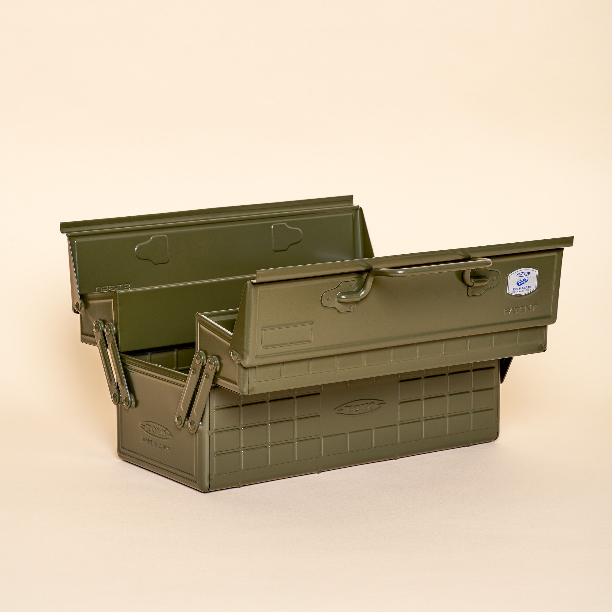 A army green organizer box that folds out to show off different compartments