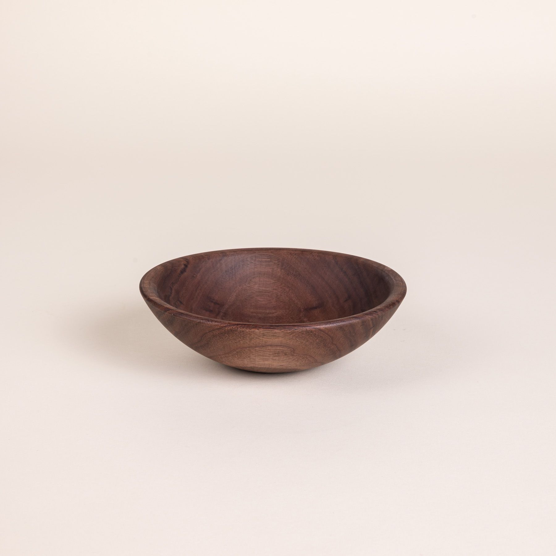 A small walnut wood bowl