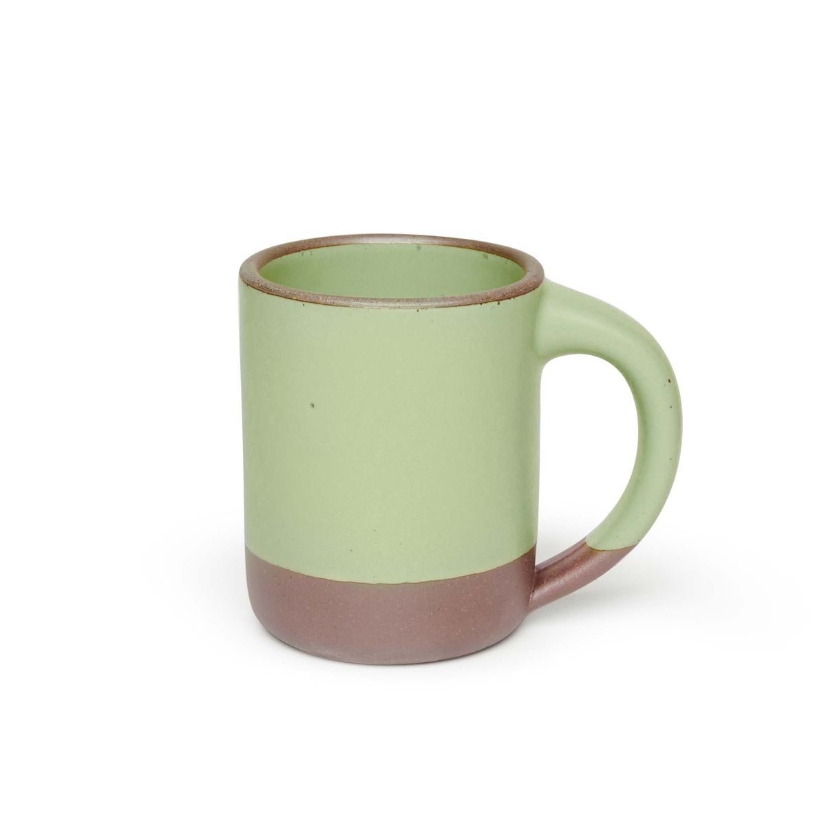 A big sized ceramic mug with handle in a calming sage green color featuring iron speckles and unglazed rim and bottom base.