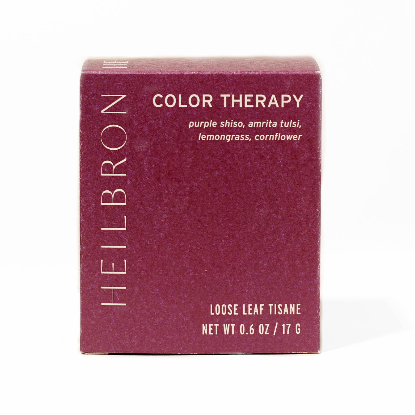 A red-purple box that reads 'Color Therapy' with loose leaf tea inside.