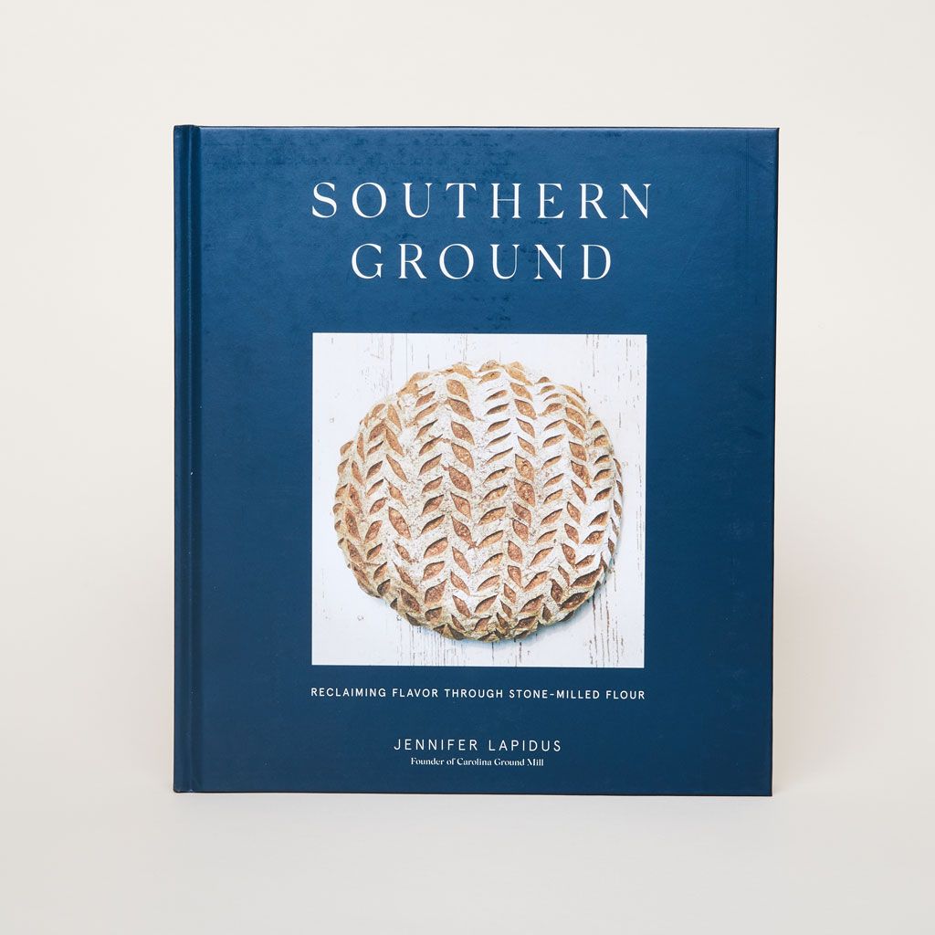 Blue cover with "Southern Ground" and a round, unsliced loaf of bread