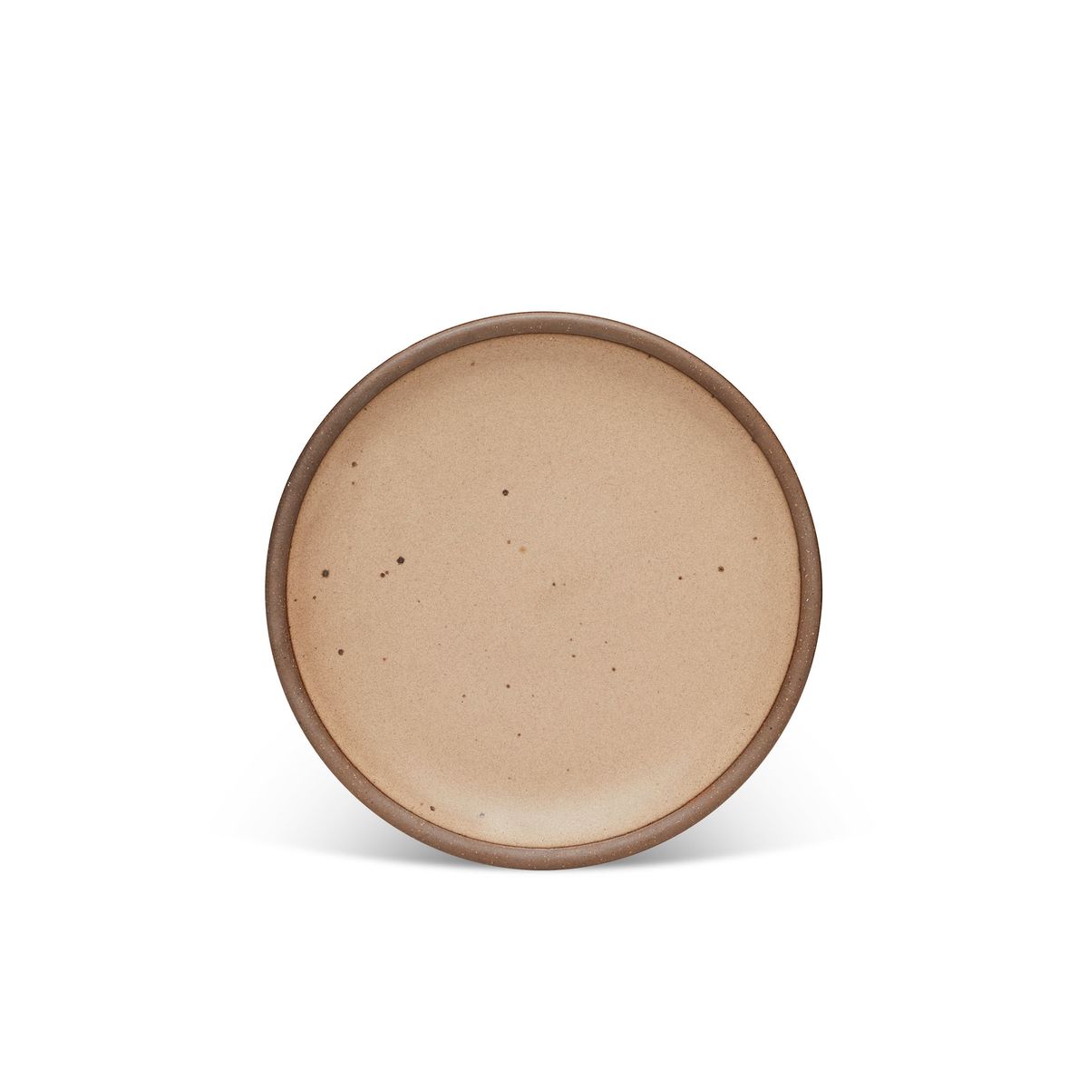 A medium sized ceramic plate in a warm pale brown color featuring iron speckles and an unglazed rim.