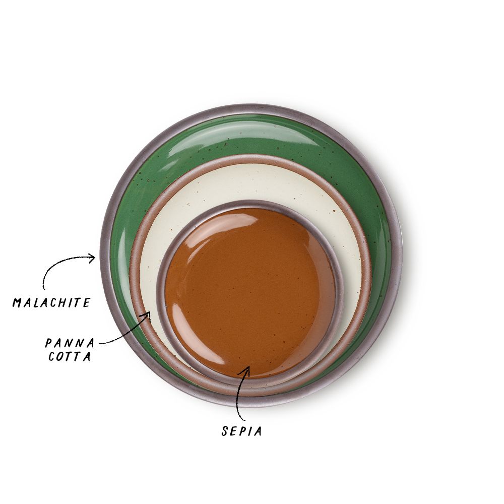 A stack of 3 plates in Dinner, Side, and Cake sizes in a glossy emerald green, warm off-white, and glossy caramel brown colors.