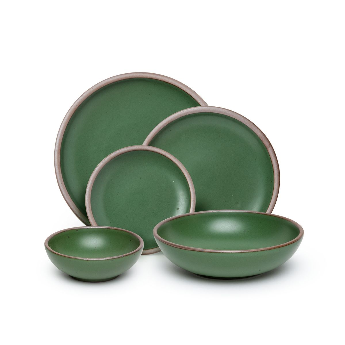 A breakfast bowl, everyday bowl, cake plate, side plate and dinner plate paired together in a deep, verdant green featuring iron speckles