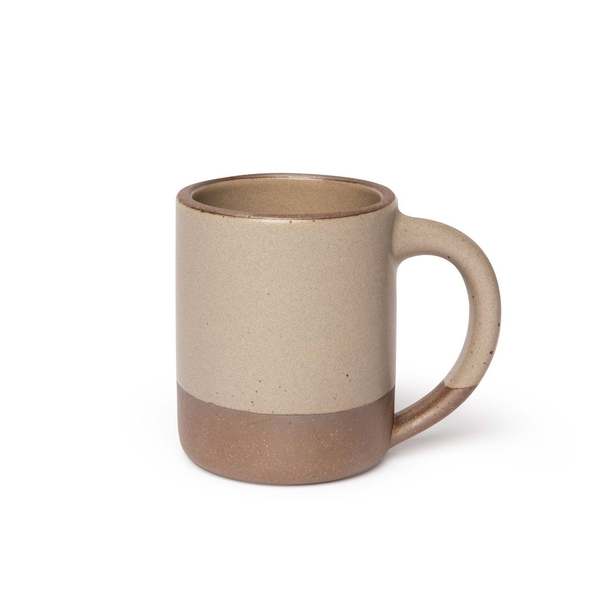 A big sized ceramic mug with handle in a warm pale brown glaze featuring iron speckles and unglazed rim and bottom base.