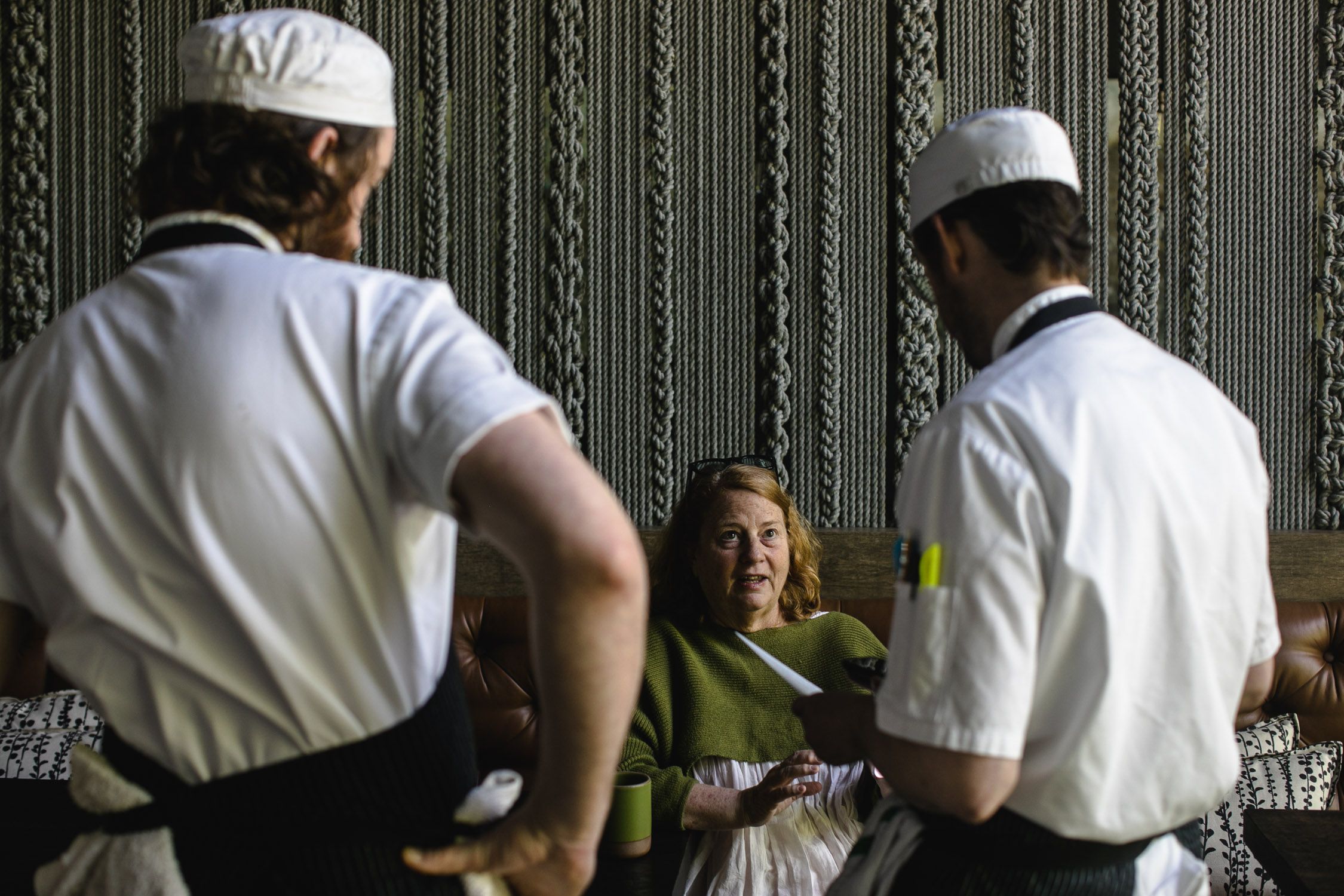 Anne Quatrano talking with her culinary team at Bacchanalia