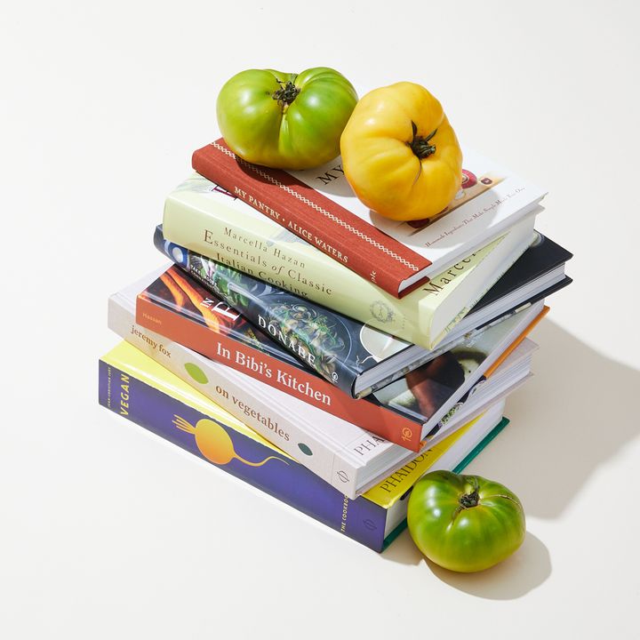 Stack of colorful cookbooks sold by East Fork