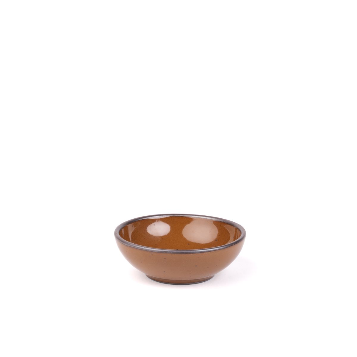A small shallow ceramic bowl in a glossy caramel brown color featuring iron speckles and an unglazed rim