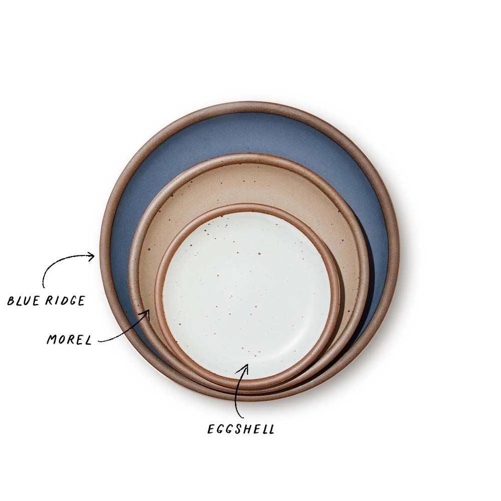 A stack of 3 plates in Dinner, Side, and Cake sizes in a cool medium blue, warm pale brown, and white colors.
