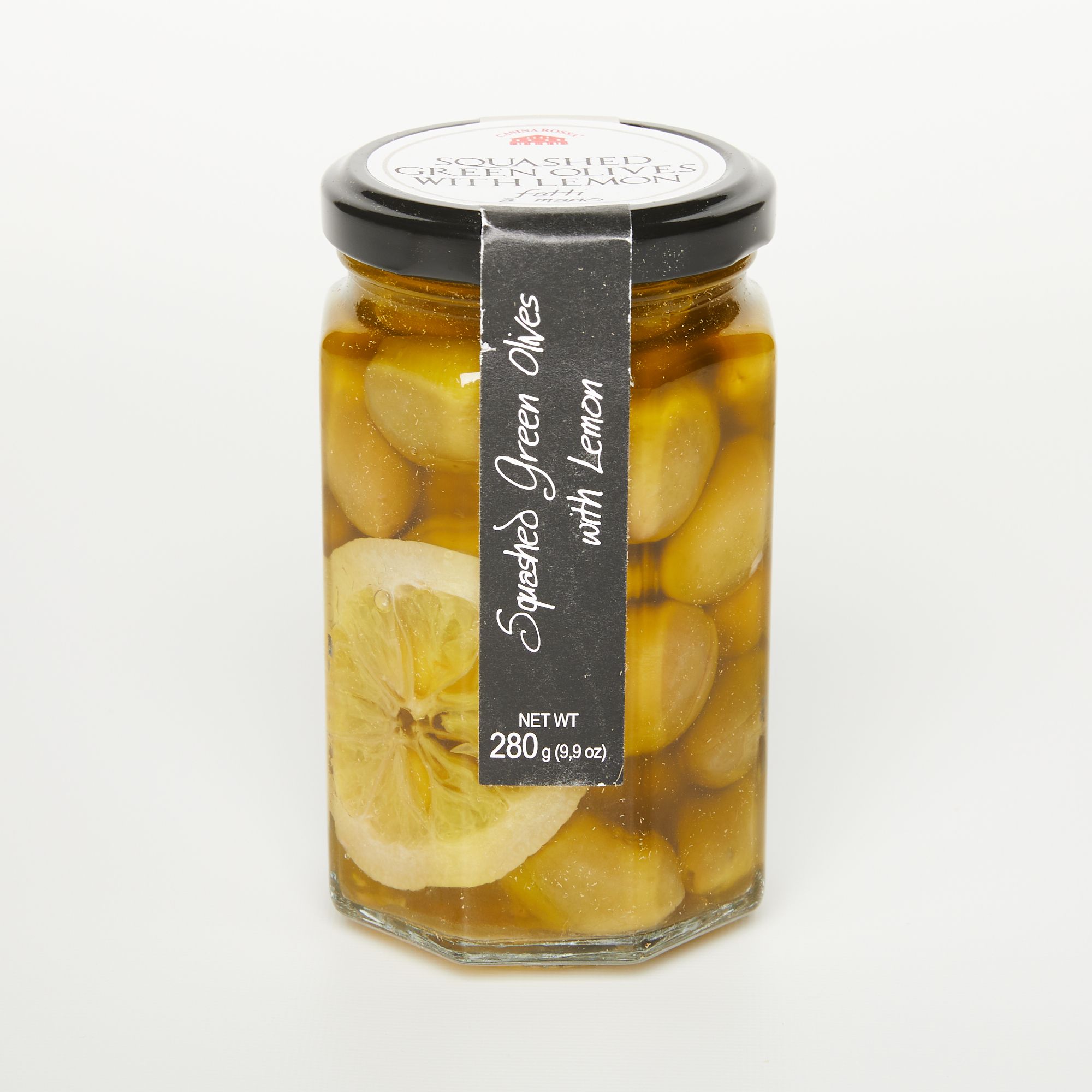 A jar of olives with lemon with a black screw lid - a label reads "Green Olives with Lemon"
