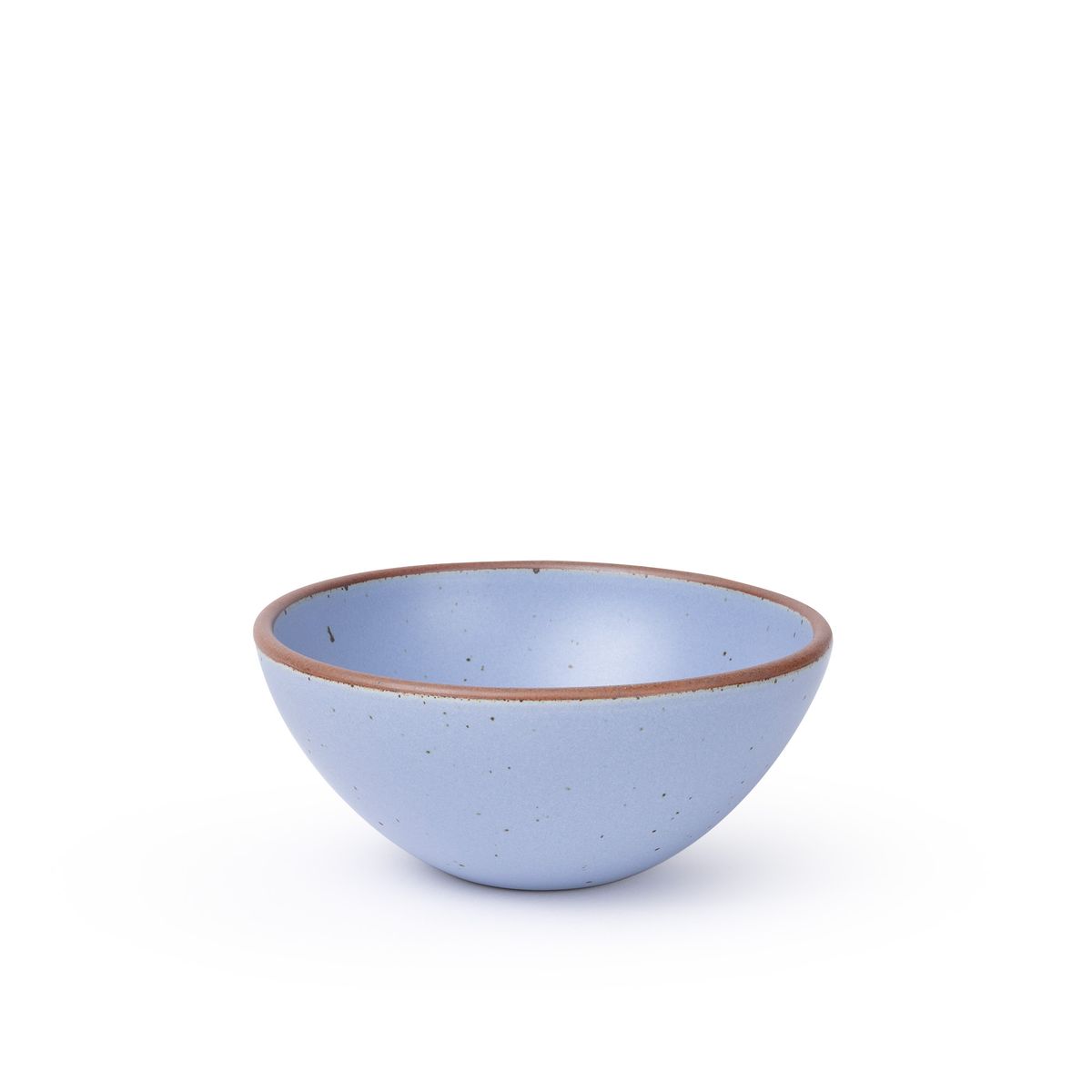 A medium rounded ceramic bowl in a periwinkle color featuring iron speckles and an unglazed rim