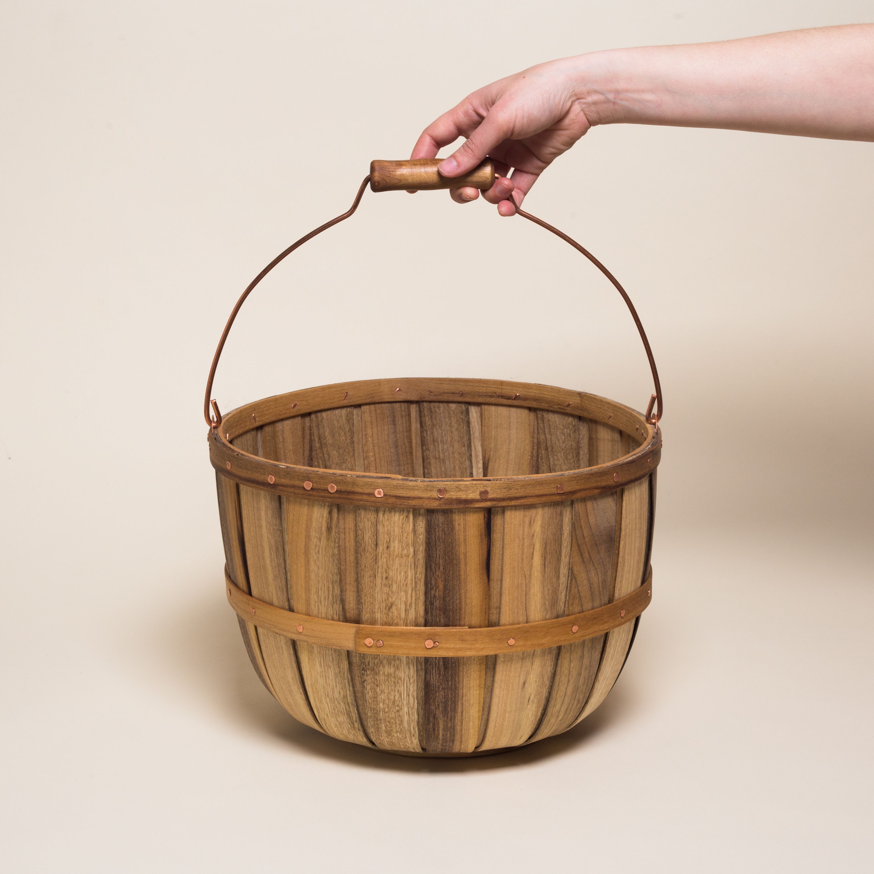 Baskets made of wood with a metal handle