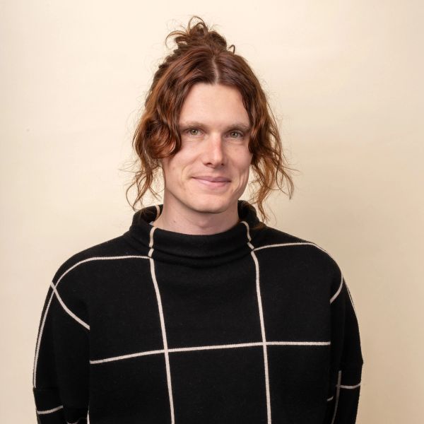 A headshot of Kyle C.