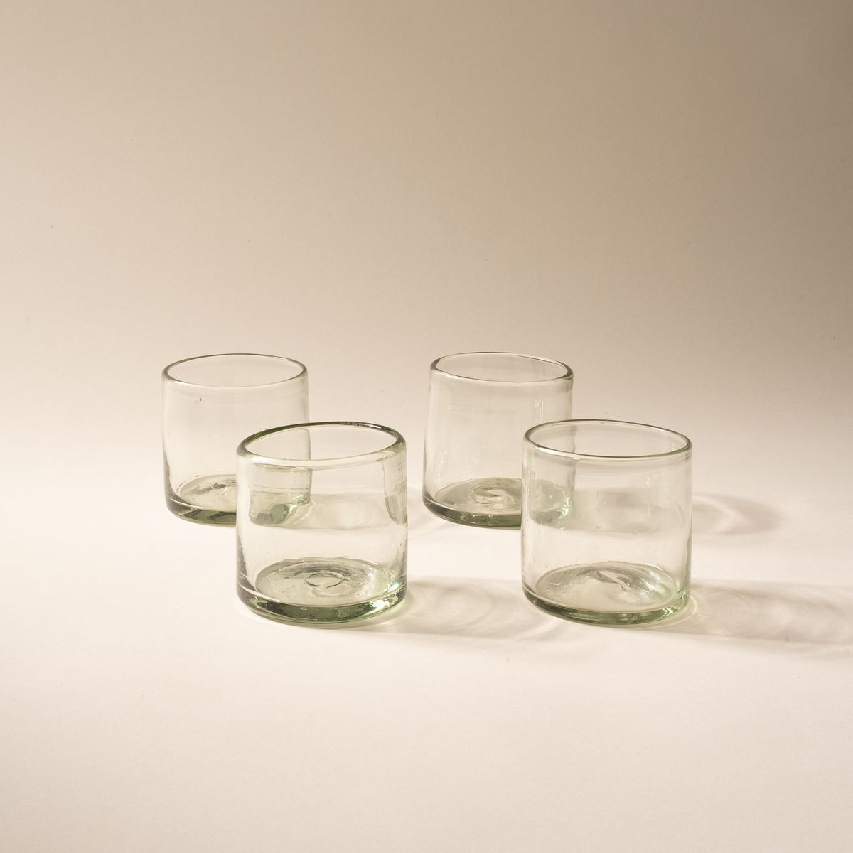4 short clear drinking glasses