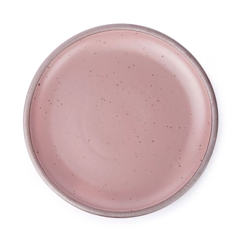 A large ceramic platter in a dusty mauve pink color featuring iron speckles and an unglazed rim.
