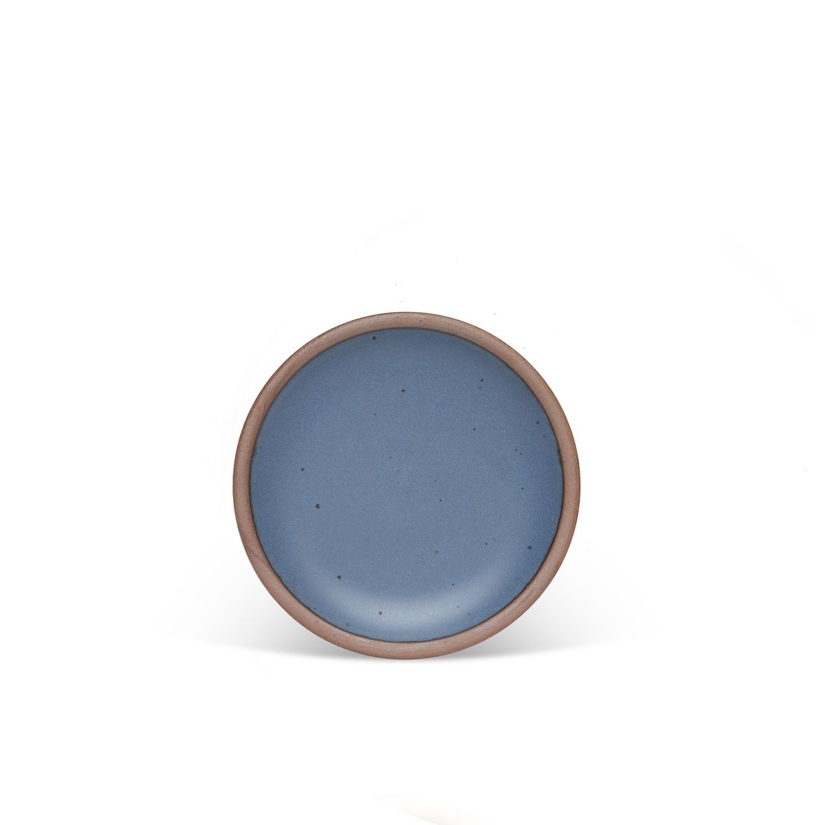 A dessert sized ceramic plate in a cool medium blue color featuring iron speckles and an unglazed rim.