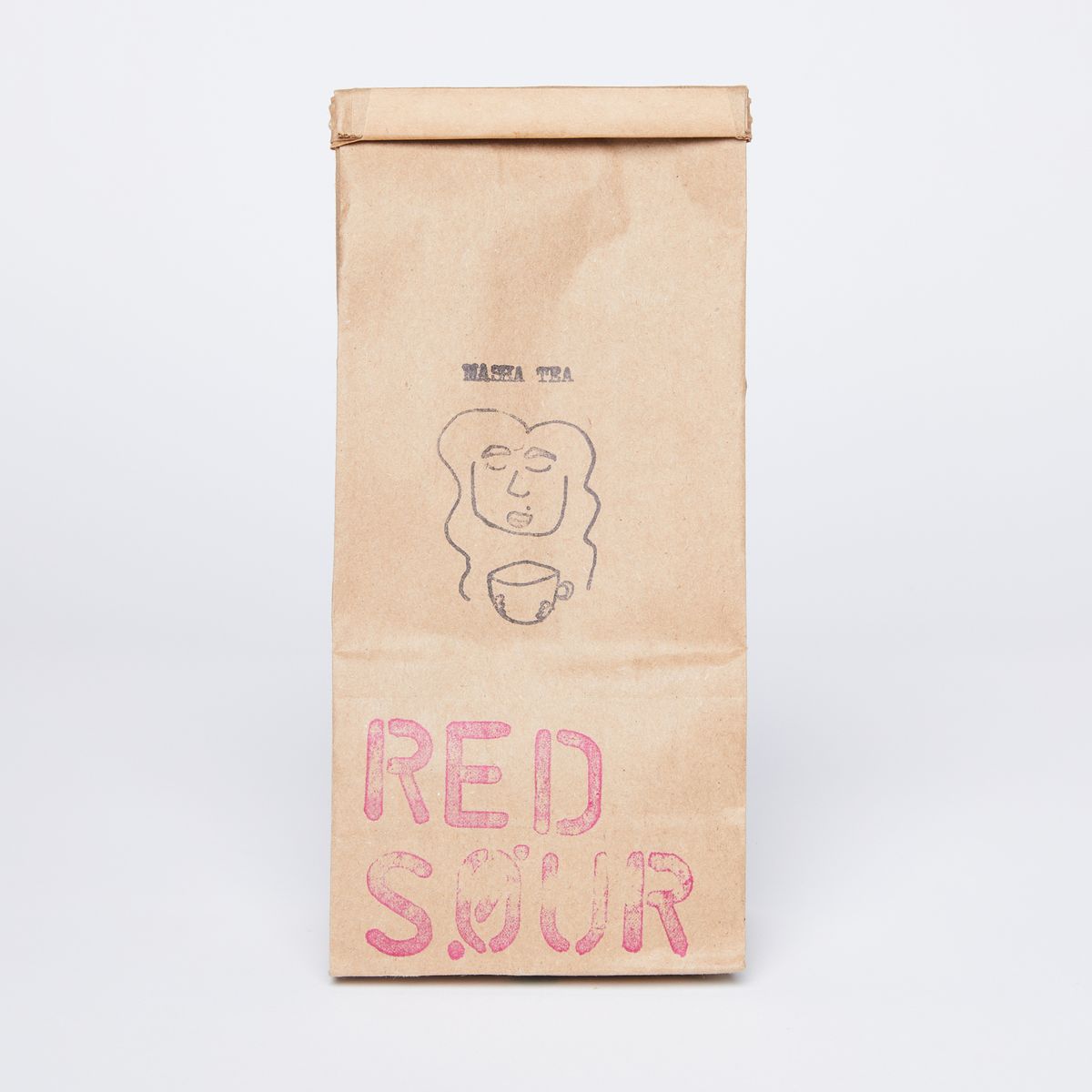 Brown paper coffee bag with red 'Red Sour' stamp and logo stamp