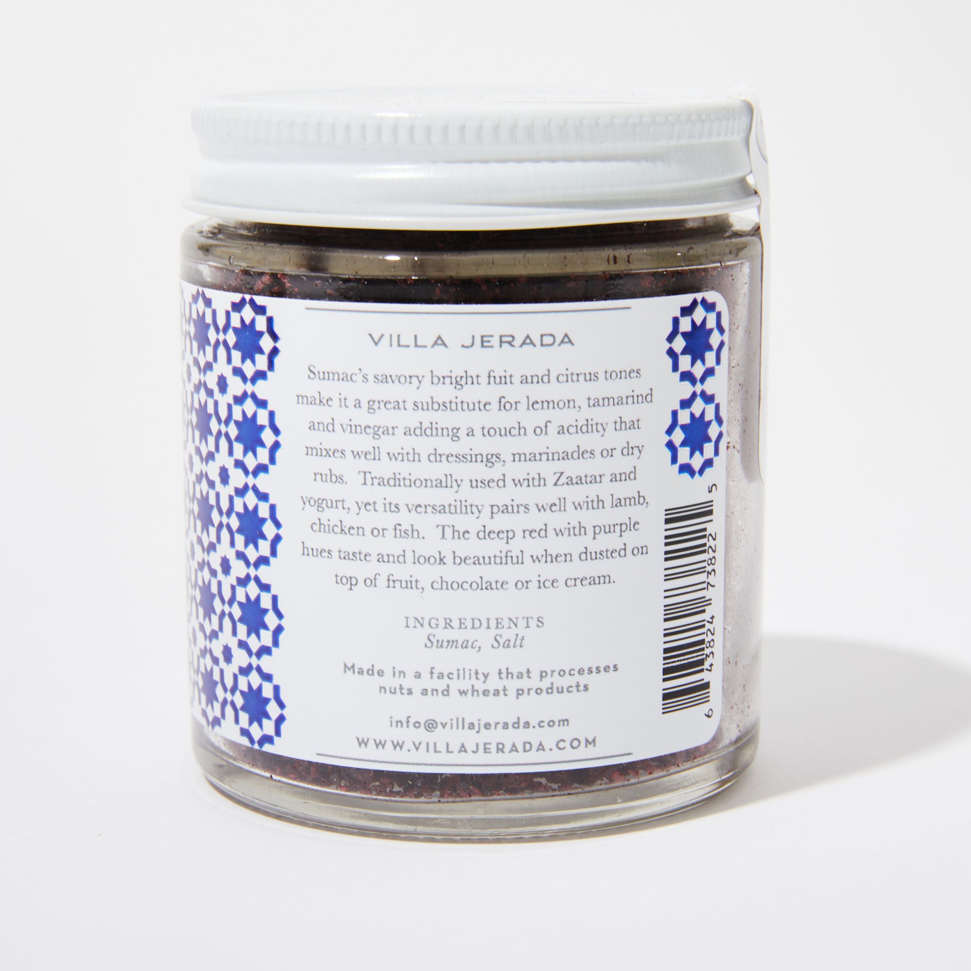 Jar with white lid and white label featuring the product description