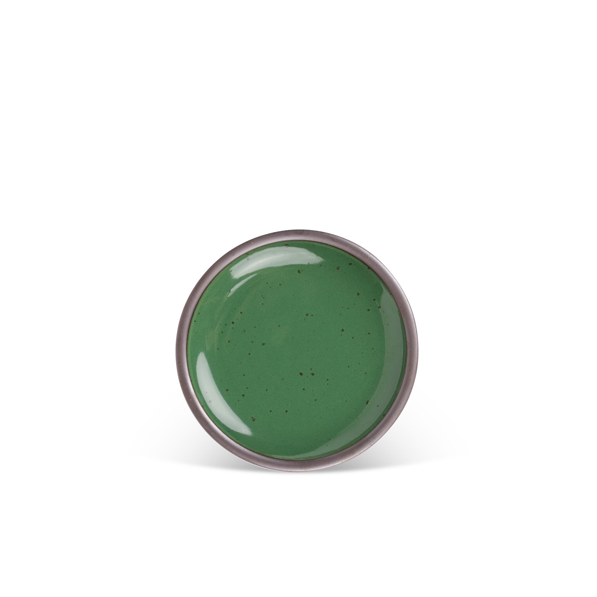 A dessert sized ceramic plate in a glossy emerald green color featuring iron speckles and an unglazed rim.