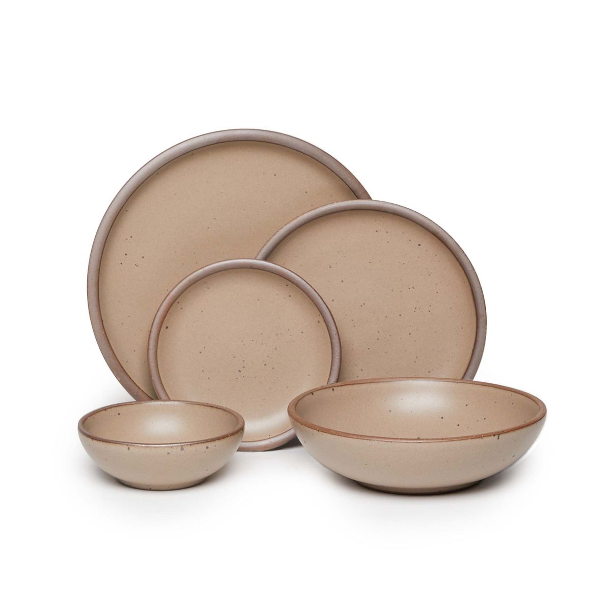 A breakfast bowl, everyday bowl, cake plate, side plate and dinner plate paired together in a warm pale brown featuring iron speckles