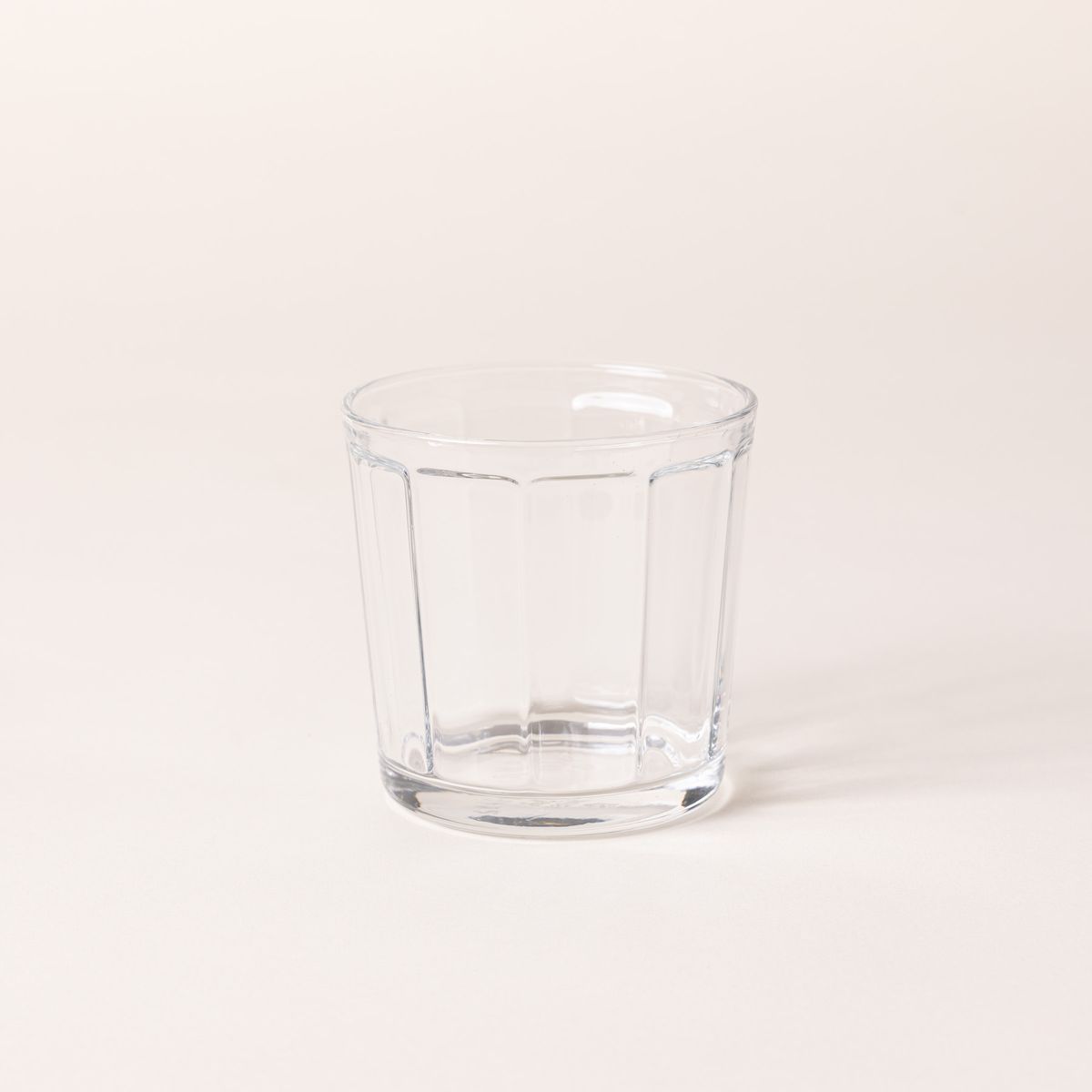 A short wide diner-style glass that tapers to be wider at the top