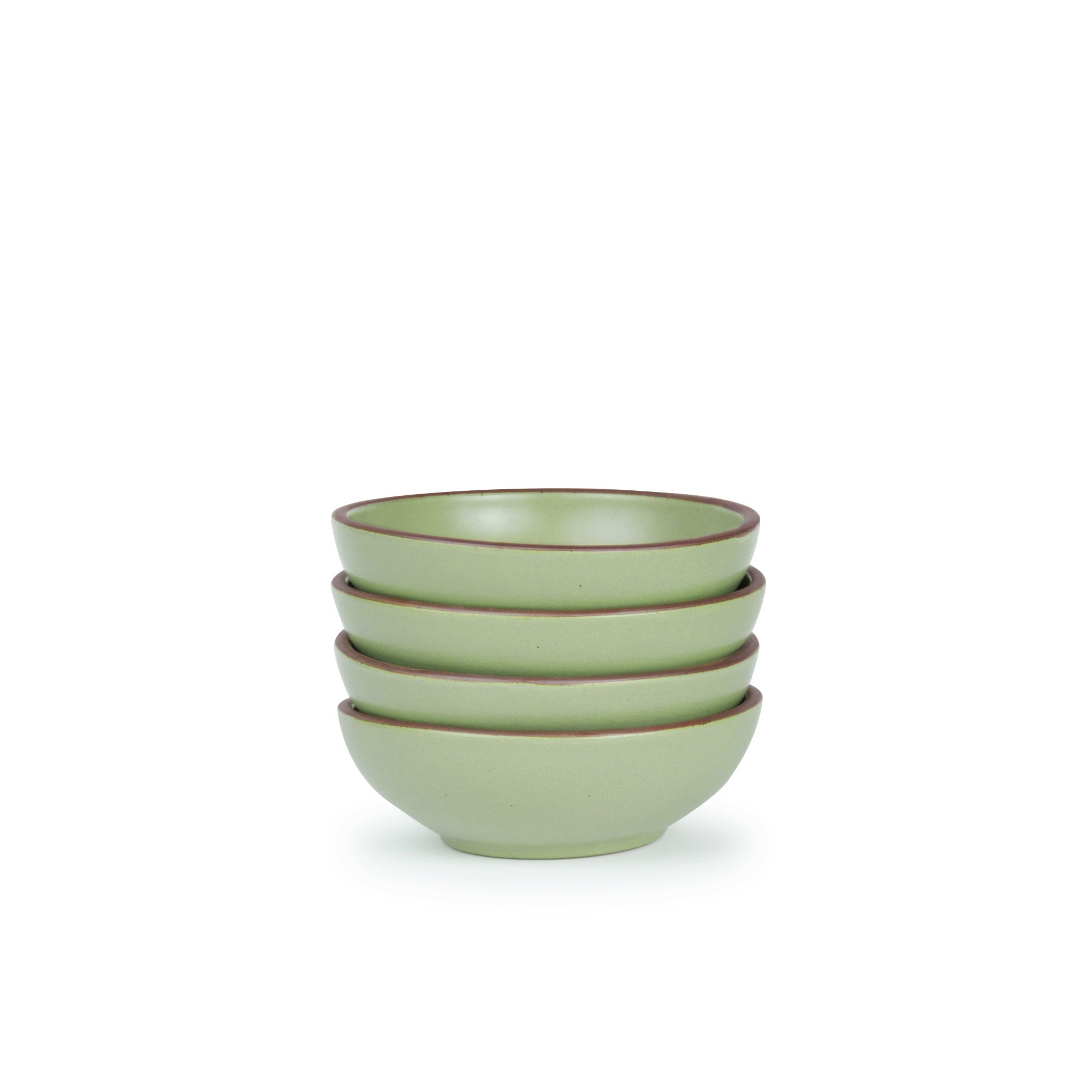 A stack of 4 small shallow ceramic bowls in a calming sage green color featuring iron speckles and an unglazed rim