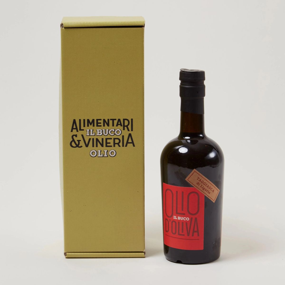 A tall narrow box next to a dark bottle with a red label that reads "Olio d'oliva"