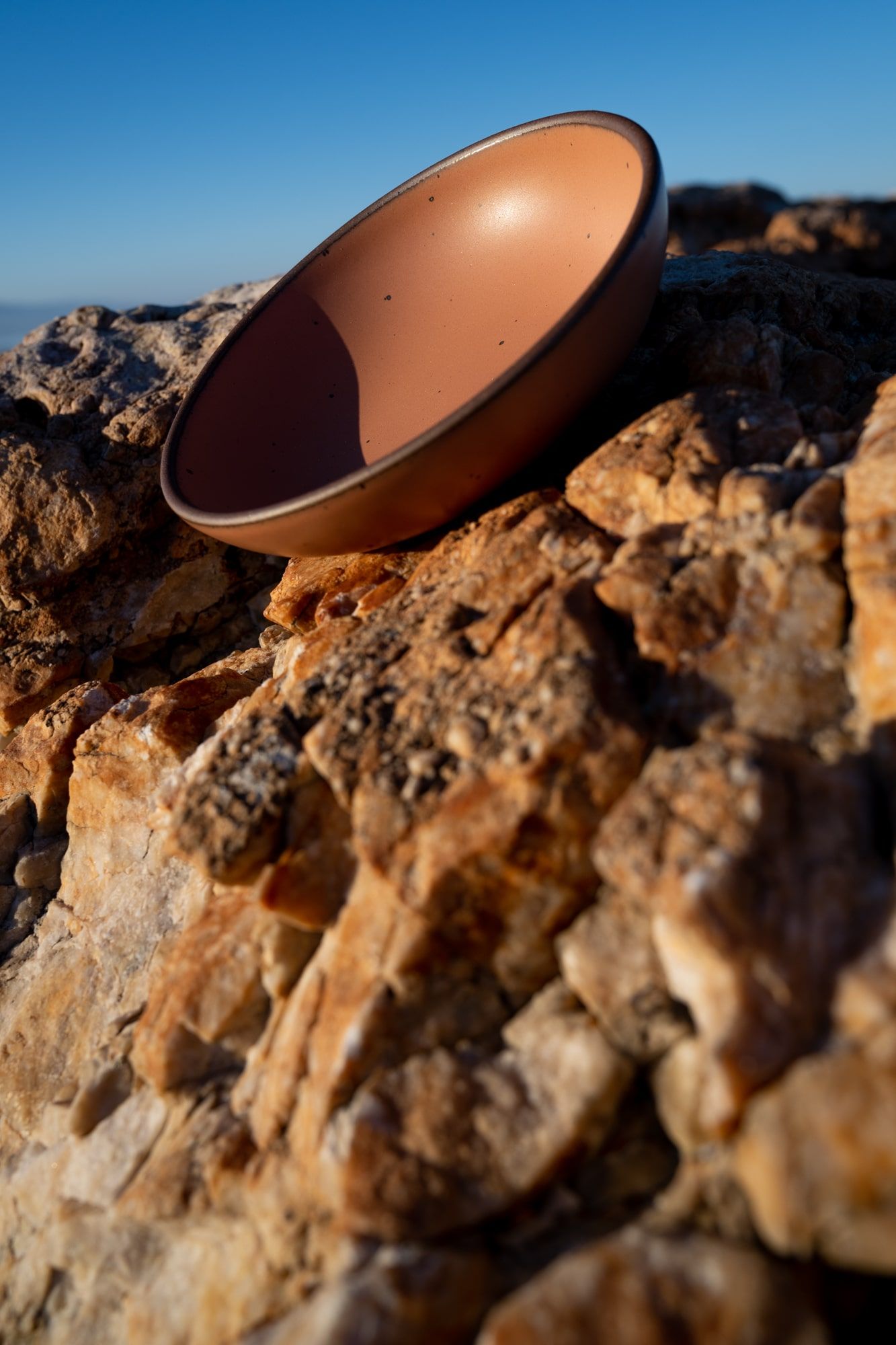 Niki Chan Wylie photo of Utah bowl balanced on rocks outside