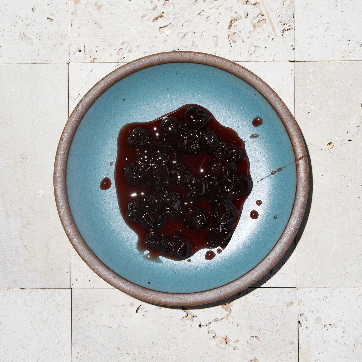 Sour cherries on secret beach plate