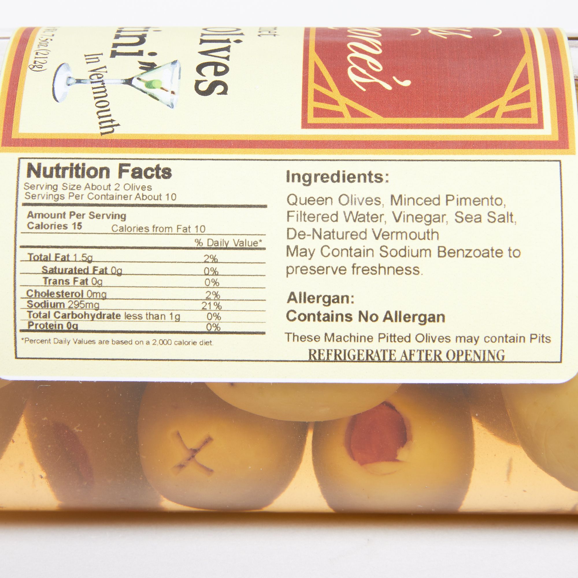 Close up on the side of a jar of olives with nutritional facts and ingredients: Queen Olives, Minced Pimento, Filtered Water, Vinegar, Sea Salt, Denatured Vermouth