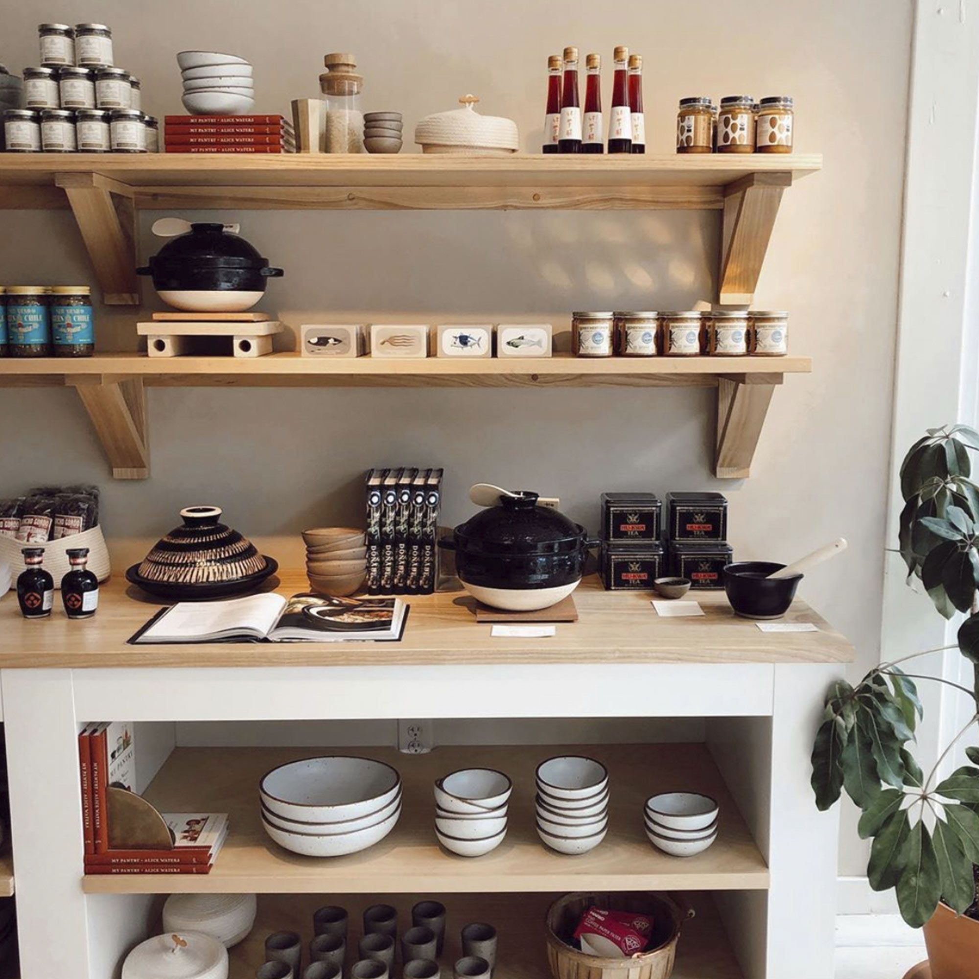 Shelves with pottery and cookware