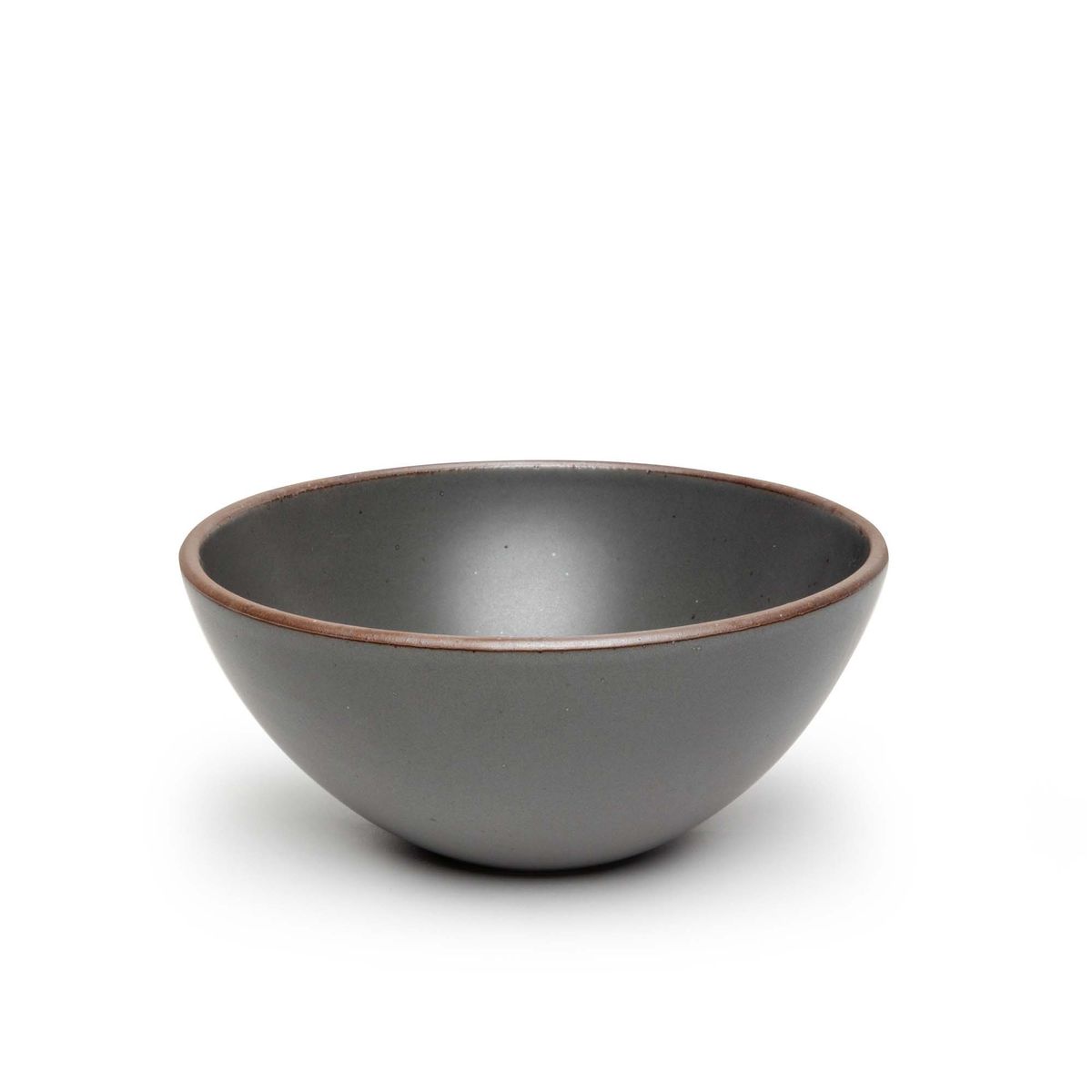 A large rounded ceramic bowl in a cool, medium grey color featuring iron speckles and an unglazed rim