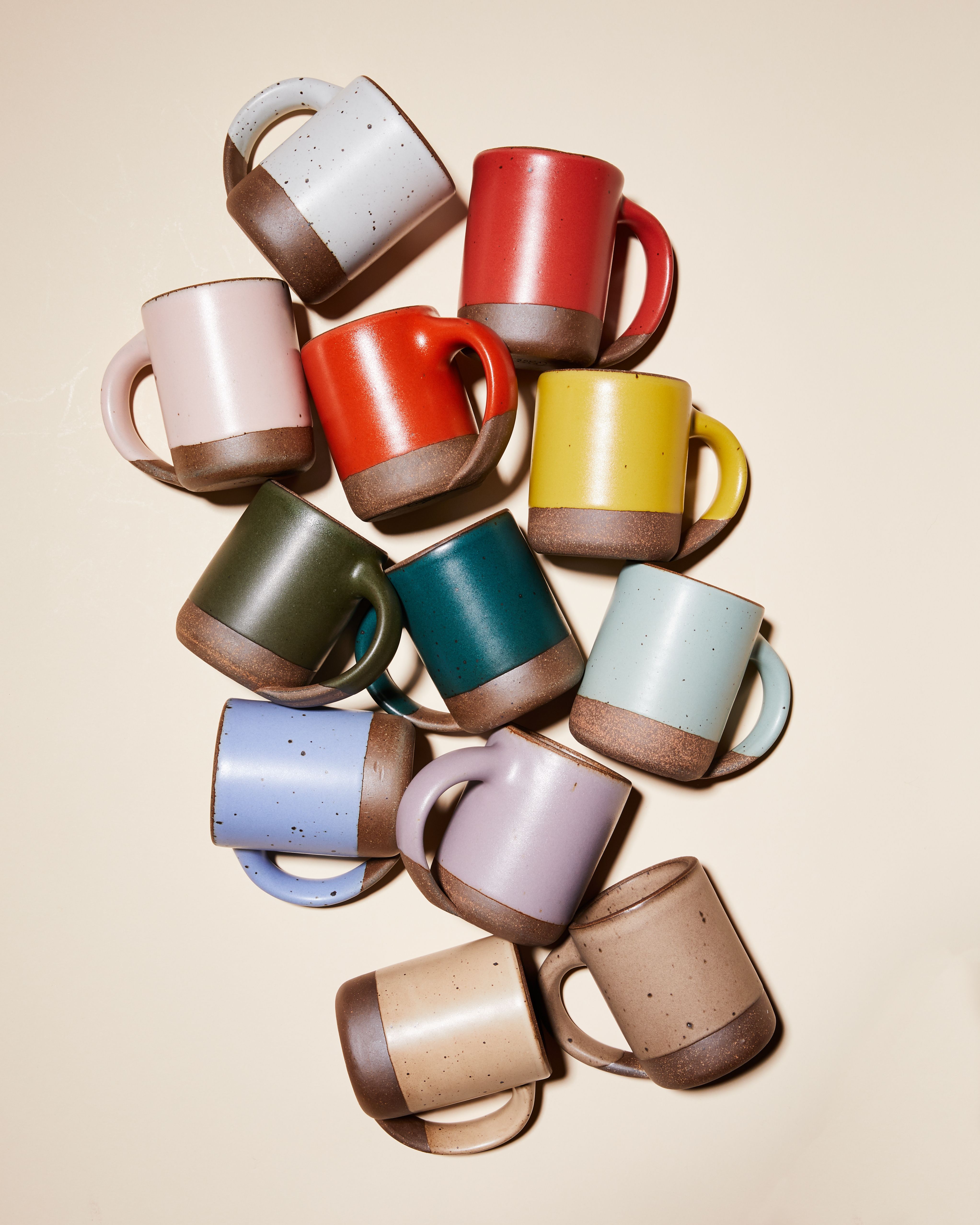 A colorful array of East Fork mugs