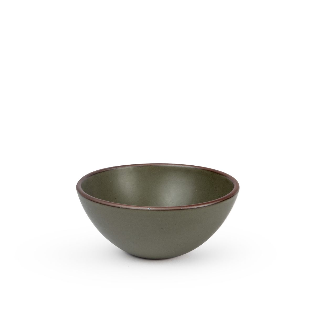 A medium rounded ceramic bowl in an earthy green color featuring iron speckles and an unglazed rim