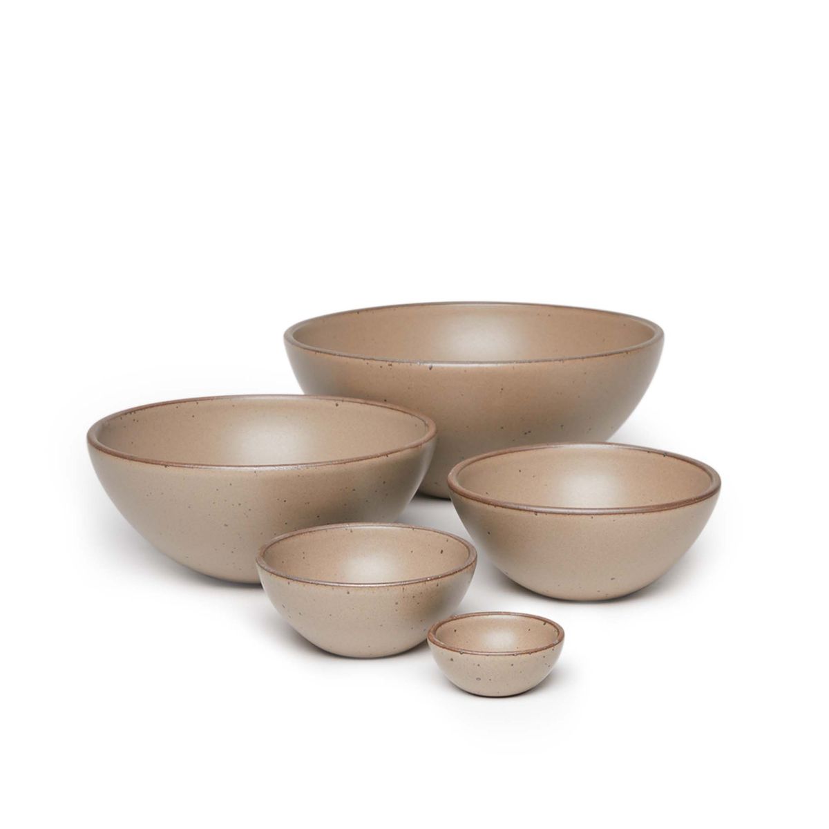 A bitty bowl, ice cream bowl, soup bowl, popcorn bowl, and mixing bowl paired together in a warm pale brown color featuring iron speckles