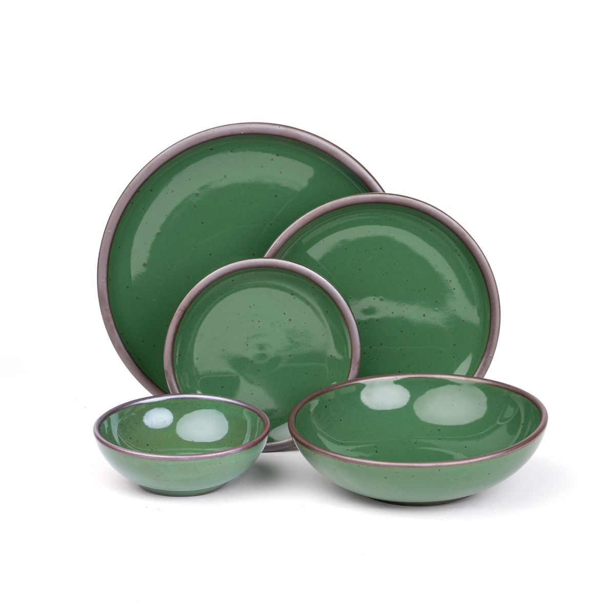 A breakfast bowl, everyday bowl, cake plate, side plate and dinner plate paired together in a glossy emerald green color featuring iron speckles