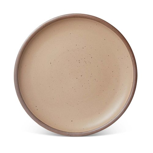 A large ceramic platter in a warm pale brown color featuring iron speckles and an unglazed rim.