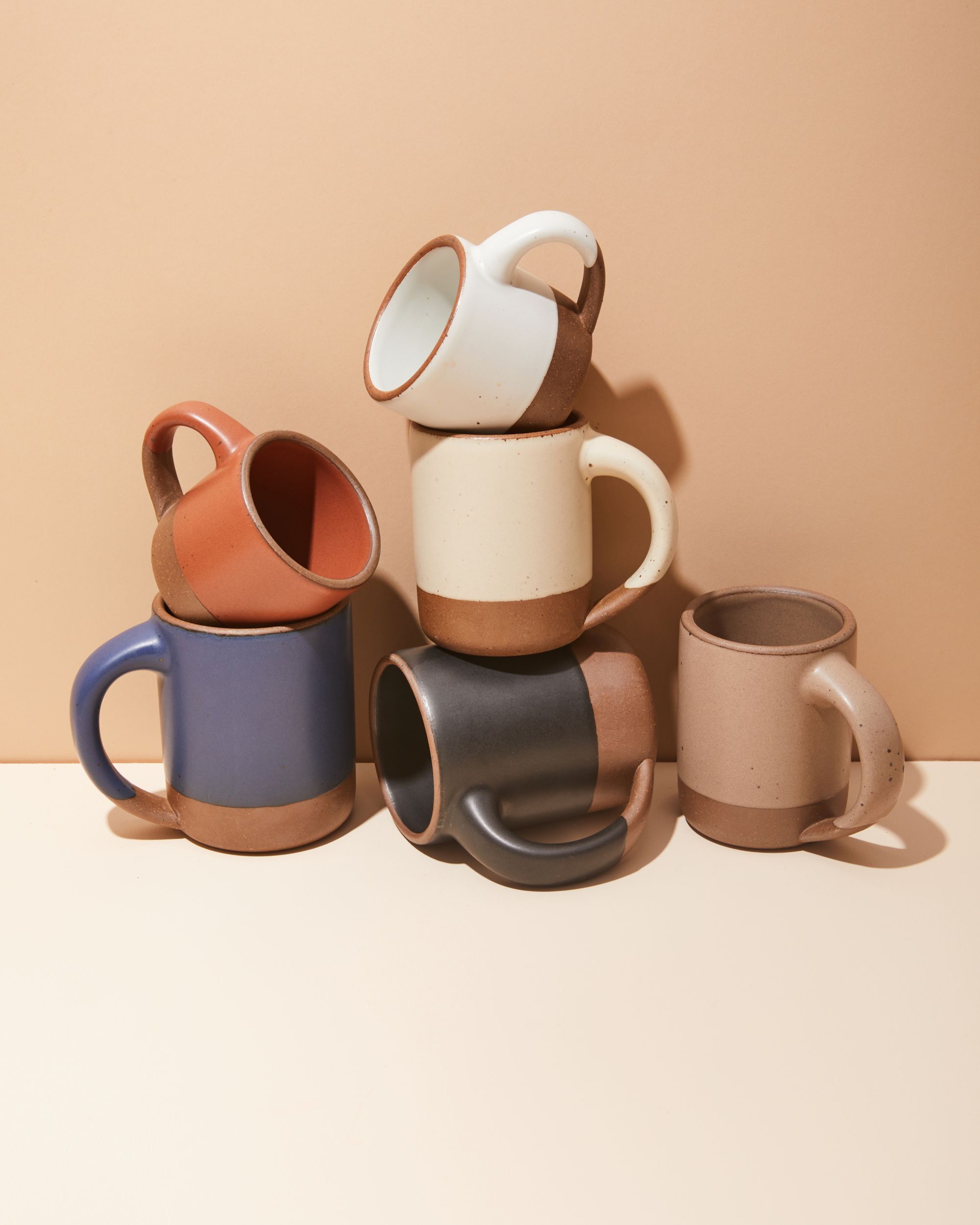 image of mugs stacked, one of each color from our core lineup. 
