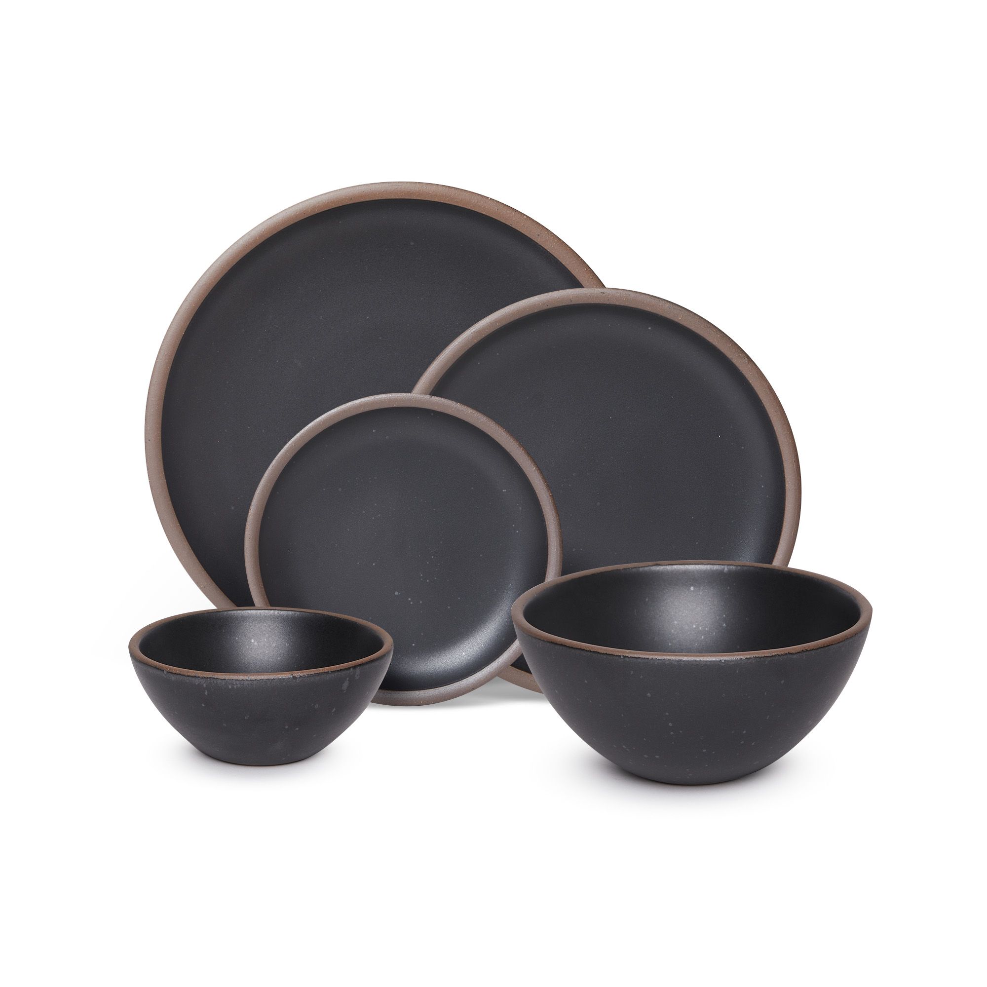 An ice cream bowl, soup bowl, cake plate, side plate and dinner plate paired together in a graphite black featuring iron speckles