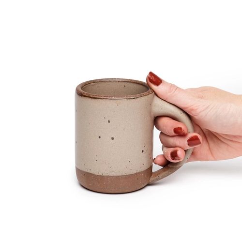 Hand holding the Mug in Morel
