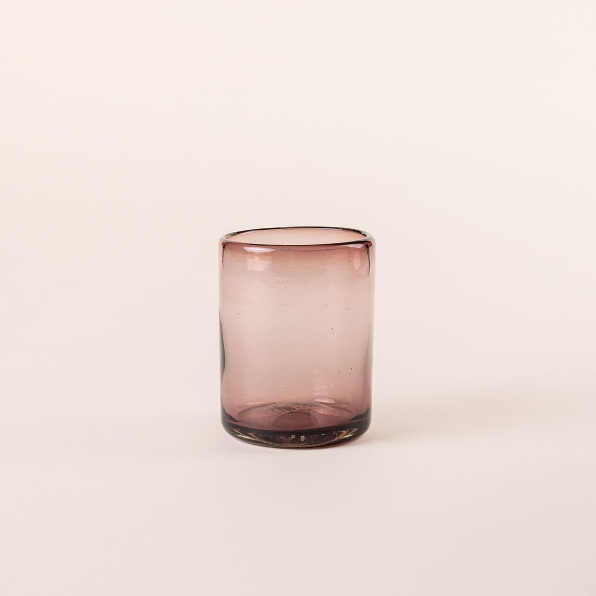 A light plum short drinking glass