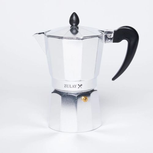 Silver stovetop espresso maker with black handle and black knob on lid