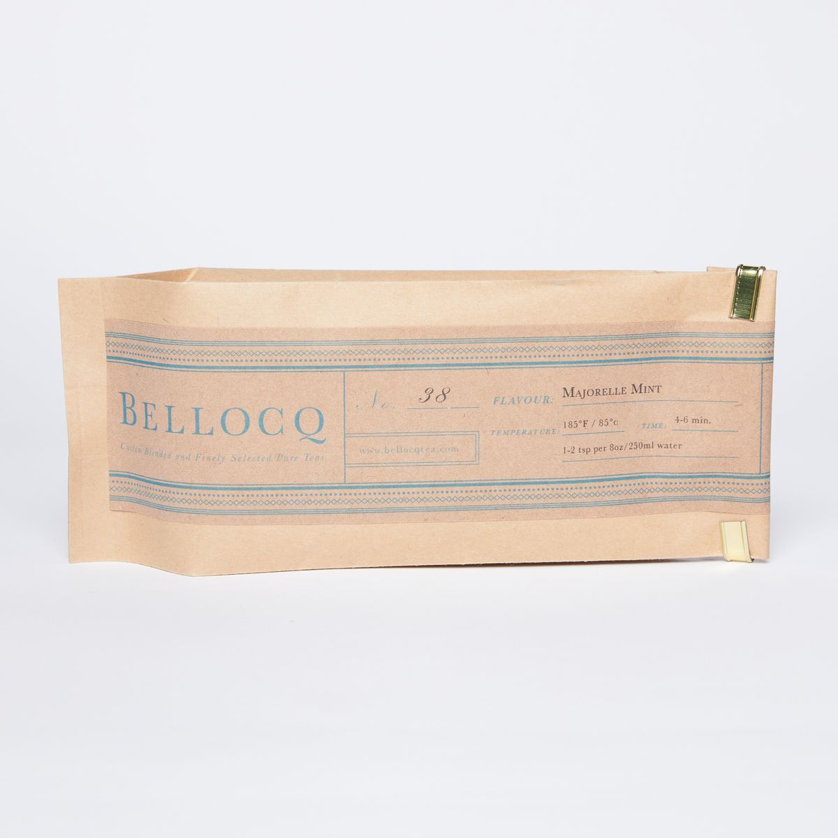Brown paper bag with blue stripes on each side and a 'Bellocq' logo and label.