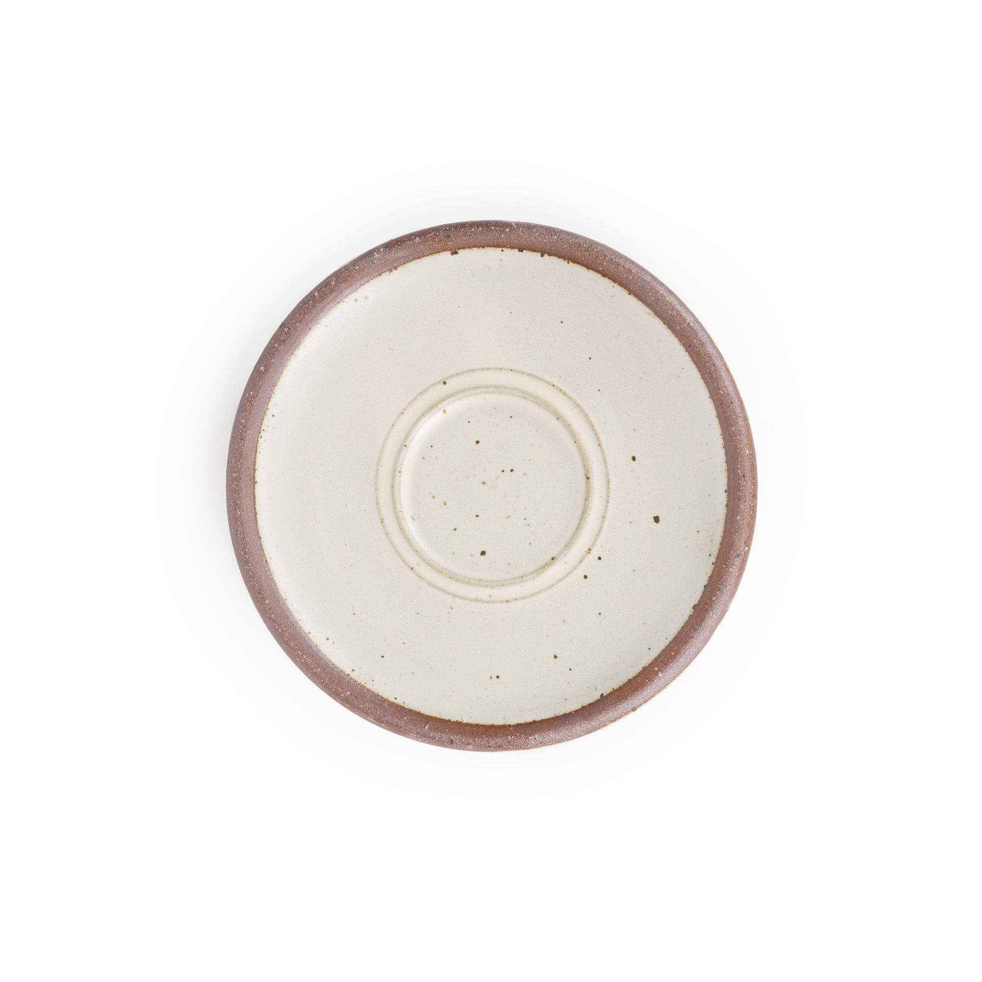A small espresso cup saucer, in a warm off-white color with iron speckles.