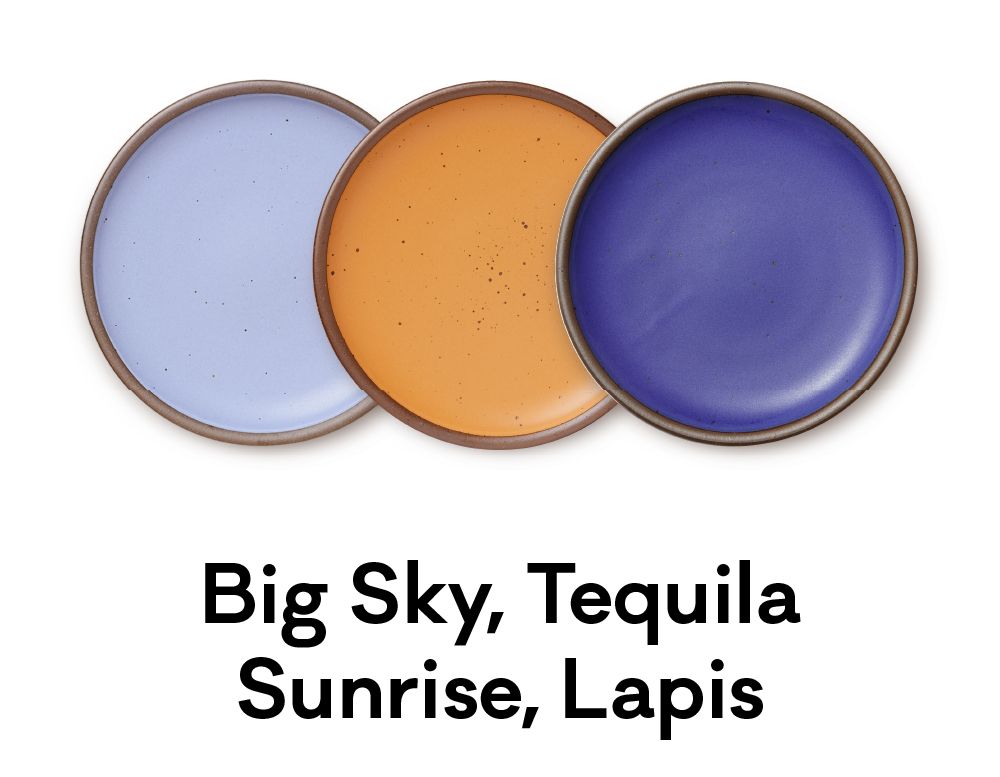 Three plates that are colored in a sky blue, a vibrant orange, and a deep blue are positioned next to each other. Beneath, text reads: "Big Sky, Tequila Sunrise, Lapis."